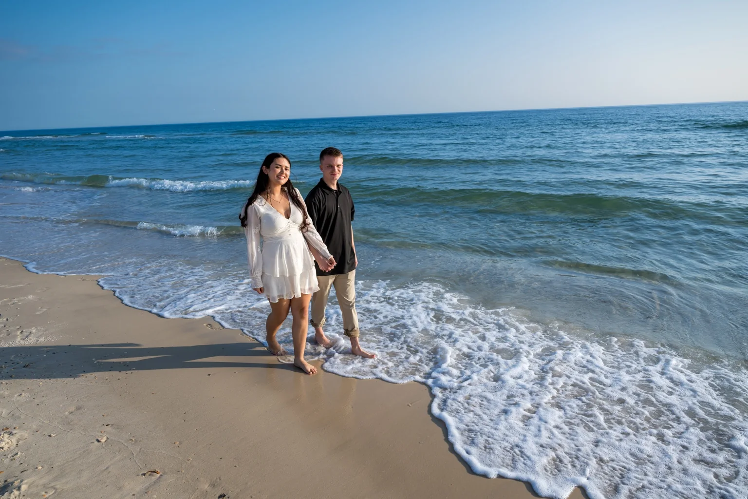 Beach portrait session in Gulf Shores Alabama for couples and families who want natural coastal photographs with lasting emotional value.