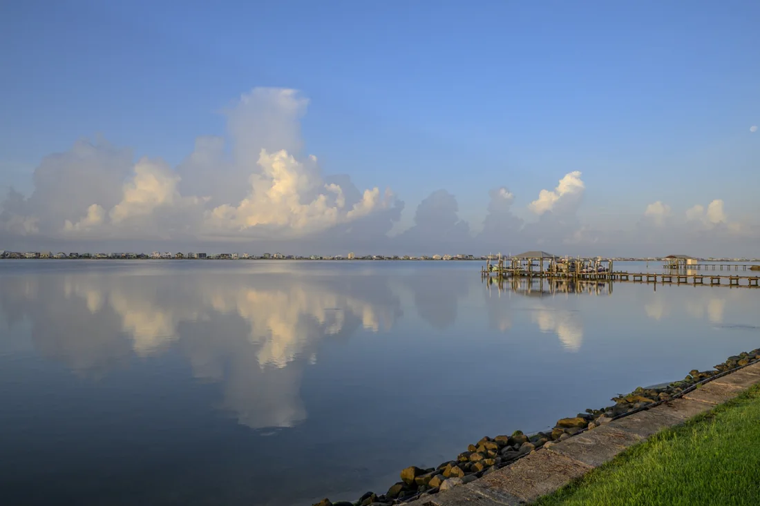 Little Lagoon cloud reflections near Gulf Shores and Orange Beach, Alabama, captured as peaceful coastal photography wall art and fine art print.