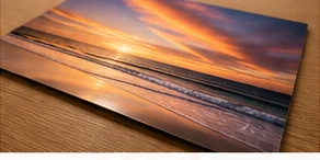 Vibrant metal coastal wall art print with a sleek modern finish and strong color contrast for beach homes and offices.